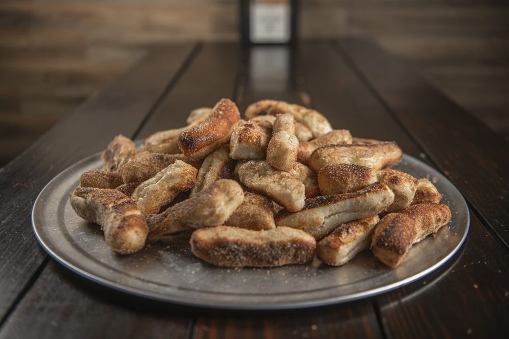 Midland Pizza Factory famous house-made breadsticks dusted with cinnamon sugar