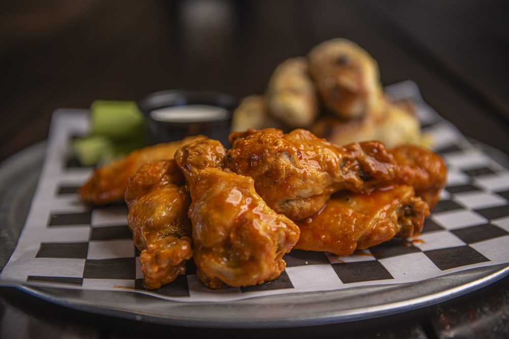 Buffalo hot wings with ranch and celery at Midland Pizza Factory